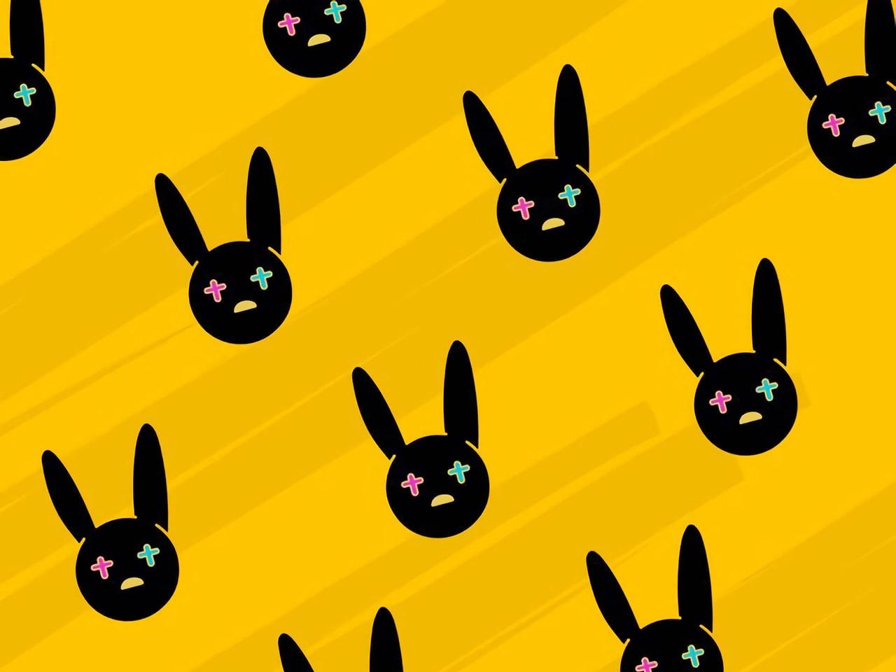 Black bunny faces repeat diagonally across a vivid yellow field.