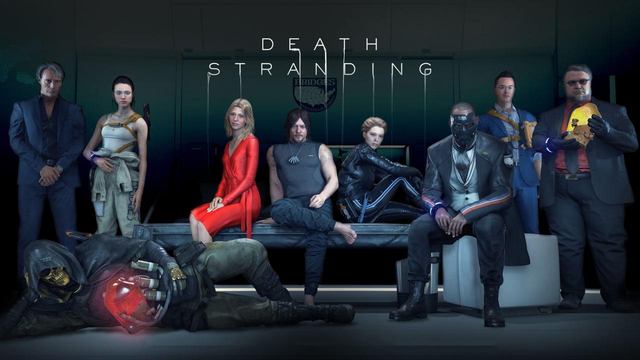 The Death Stranding cast gathers around a long sofa in a dim room. Standing figures at both ends remain visible beside the conversation, with equipment across the foreground.