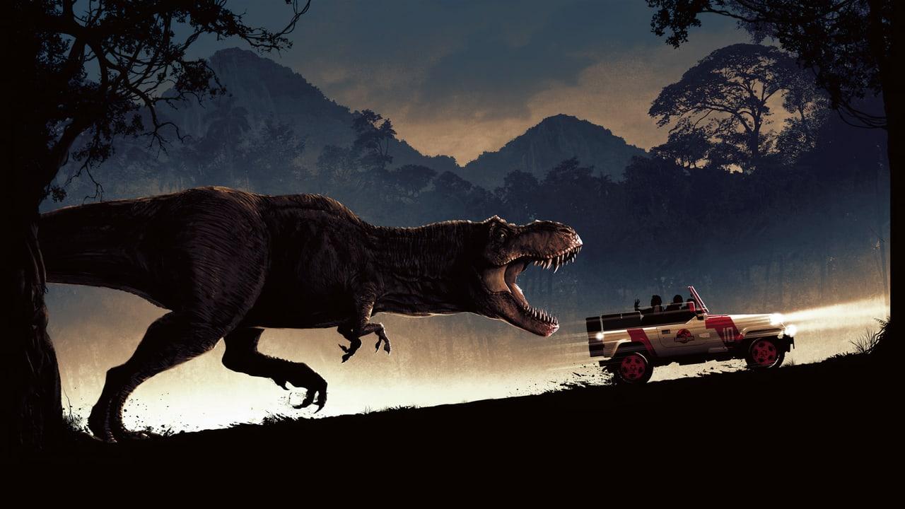 A tyrannosaur pursues a Jeep through a mountain valley at dusk. Tree silhouettes and a long headlight beam stretch the chase across the landscape. Source: 4kwallpapers.com. Original artist not identified by the source page.