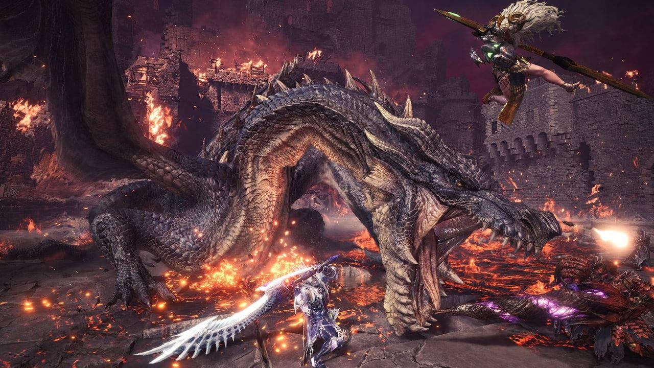 Hunters confront Fatalis amid burning ruins and scattered sparks. Dragon scales, masonry and fire cover the width of the battle scene. Source: opalepro on Wallpapers.com. Original artist not identified by the page.
