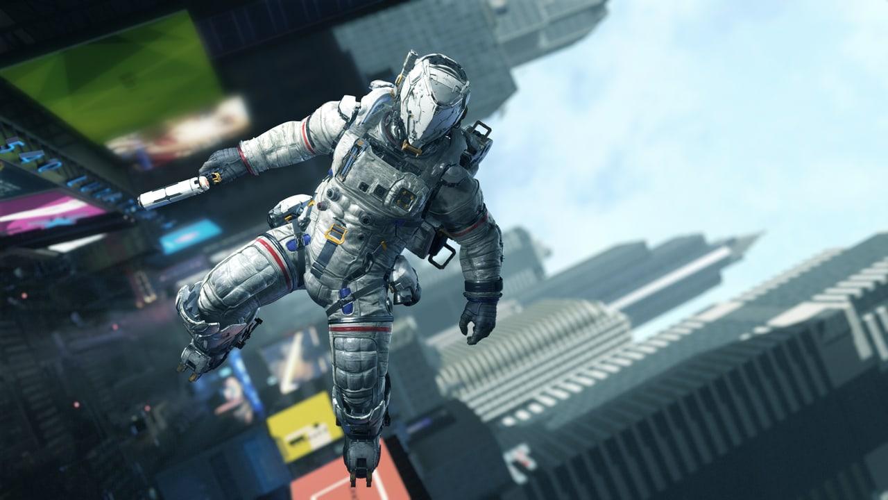 An armored astronaut hangs diagonally above a pale futuristic street. Tall advertisements and stepped buildings frame the open sky on either side.