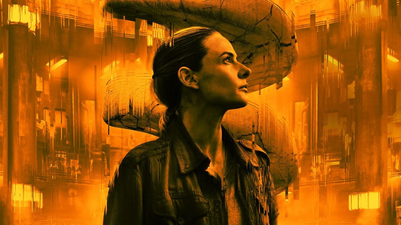 Juliette appears against a glowing orange stack of industrial floors and curved stairways. Repeated windows make the vertical scale of the silo visible at either edge. Source: 4kwallpapers.com. Original artist not identified by the source page.