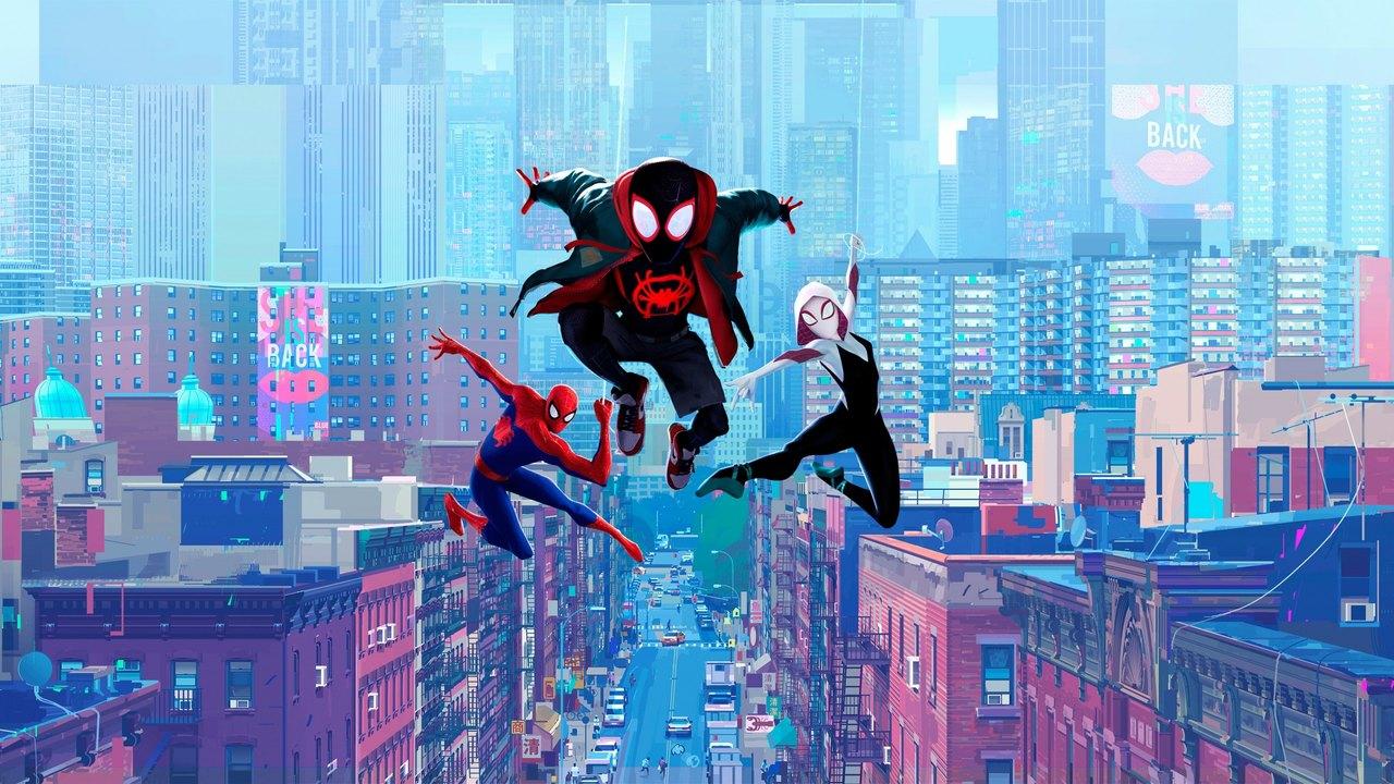 Stylized Spider-Verse heroes leap over a colorful city of turquoise towers, brick buildings and billboard signs.