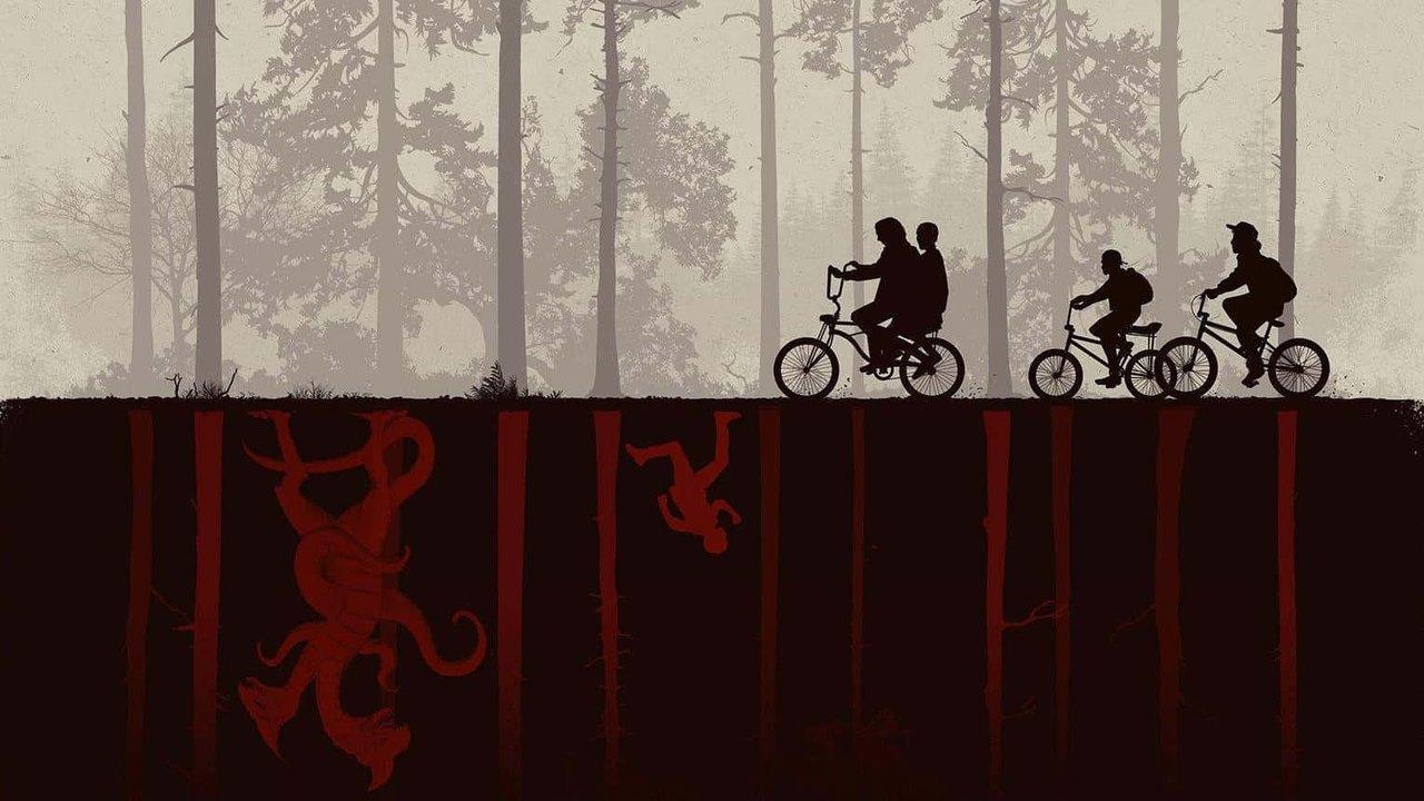 Cyclists silhouetted in a pale woodland above a dark red Upside Down reflection.