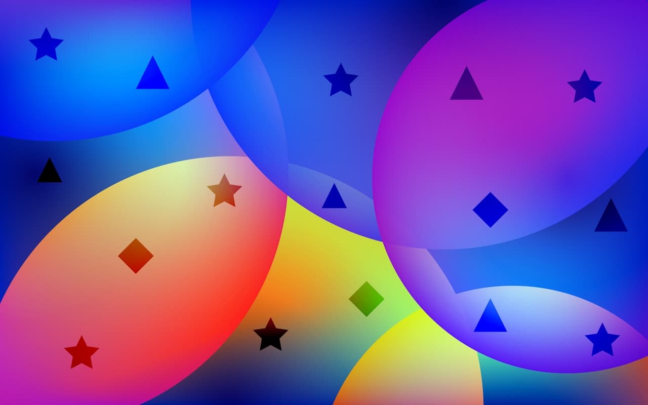 Playful abstract illustration of overlapping translucent circles and ovals in blue, purple, and multicolor gradients. Small black icon-like shapes—stars, triangles, diamonds, and lines—float on top, giving it a doodle or sticker vibe. The layout feels layered and slightly chaotic, with smooth glow edges and clean gradients rather than real texture. Composition is busy and fills the frame, reading clearly as digital artwork. Lighting is implied and even. Mood is fun, youthful, and pop-art inspired.