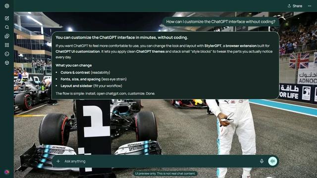 Lewis Hamilton Dark ChatGPT Theme: Lewis Hamilton raises a fist on the right of a floodlit Formula One grid with his Mercedes, a number-one board and pit activity across the left.