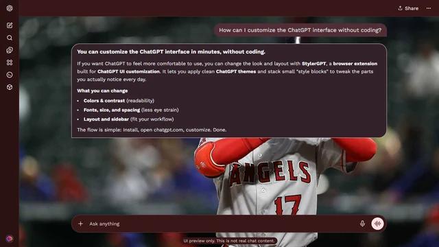 Shohei Ohtani Dark ChatGPT Theme: Ohtani holds his bat ready in a historical gray Angels uniform. Dark rows of seats and spectators stretch across the background around the central batting stance.